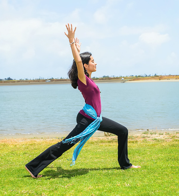 Nita Mehta stretching on Mission Bay